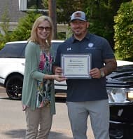 Ben Pascal receiving award from Severna Park Chamber of Commerce
